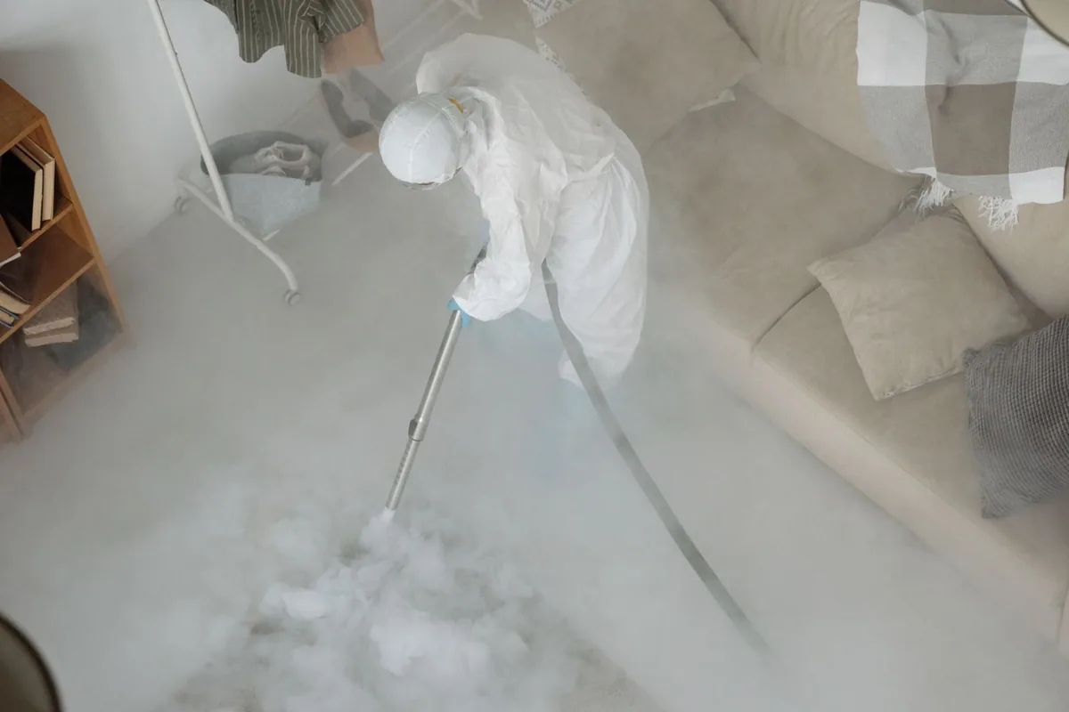 Biohazard cleanup technician in protective equipment, Port Ewen, NY